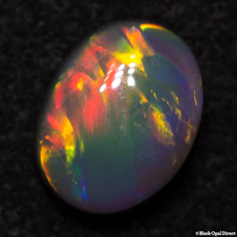 0.95 ct semi black opal 7x5x3mm - Image 2