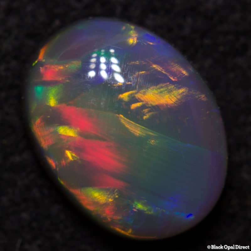 0.95 ct semi black opal 7x5x3mm - Image 3