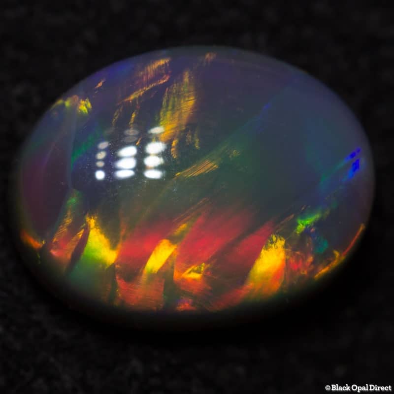 0.95 ct semi black opal 7x5x3mm - Image 4
