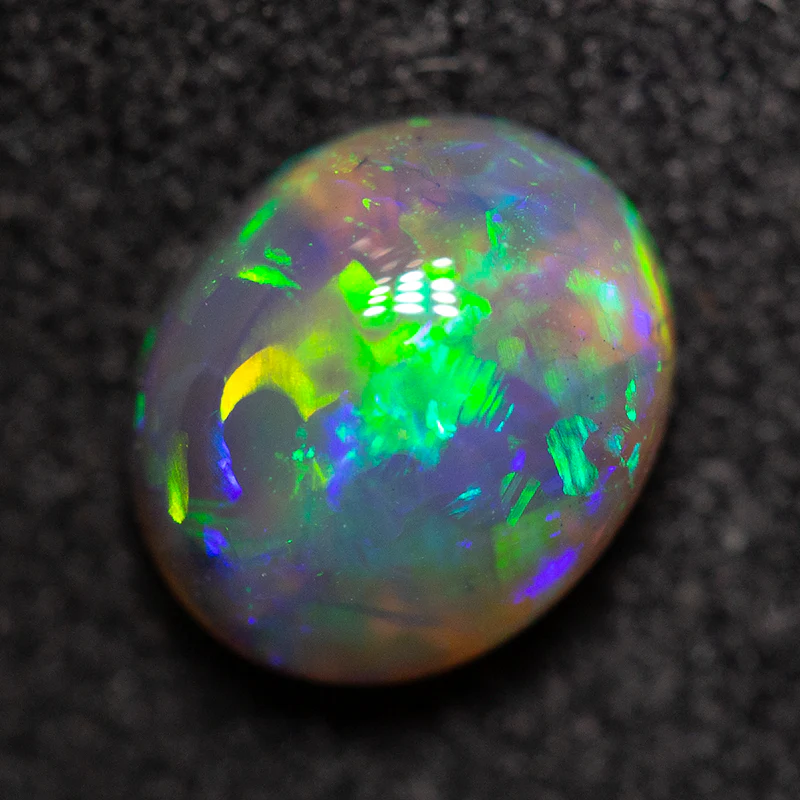 0.95ct black opal 7x6x3.8mm - Image 3