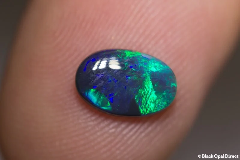 0.96 ct black opal 9x6x2mm - Image 2
