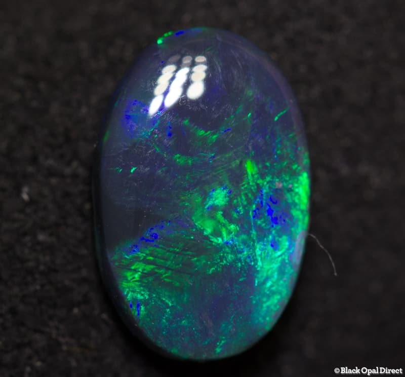 0.96 ct black opal 9x6x2mm - Image 3