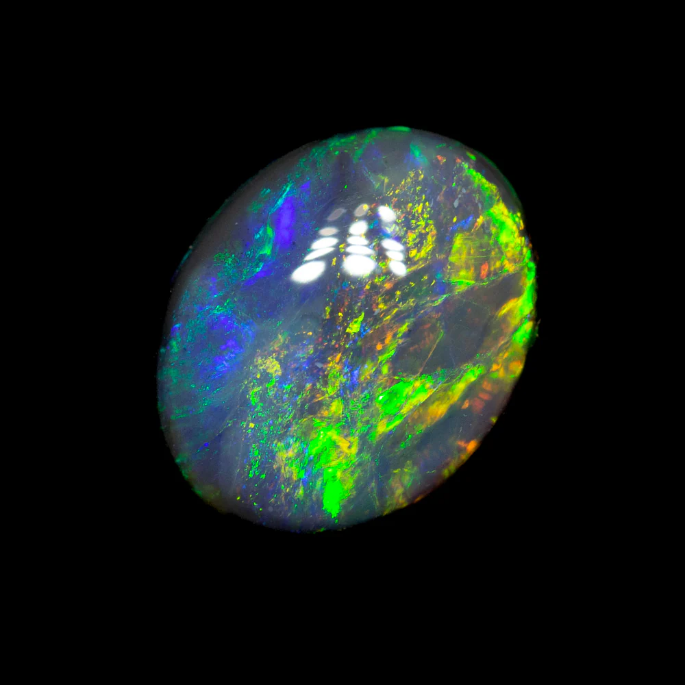 0.97 ct black opal 8.2x6.5x2.8mm - Image 2