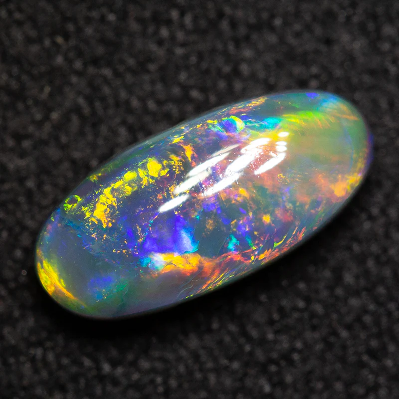 0.97 ct black opal 9.3x4.2x3.5mm - Image 2