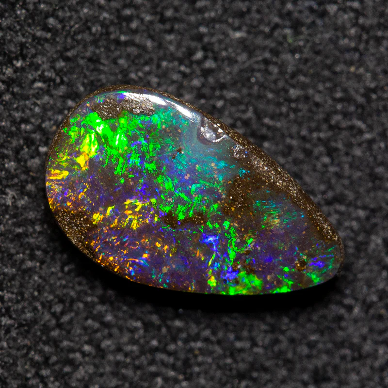 0.97 ct boulder opal 8.6x5x3mm - Image 2