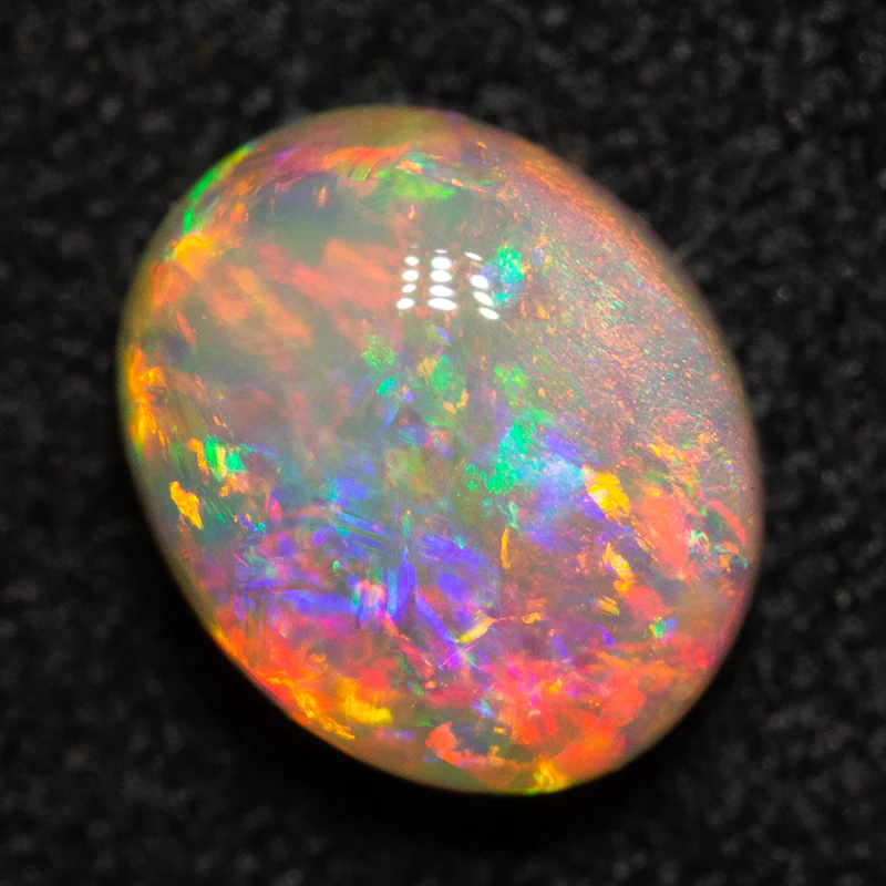 0.97 ct crystal opal 6.9x5.7x4mm - Image 2