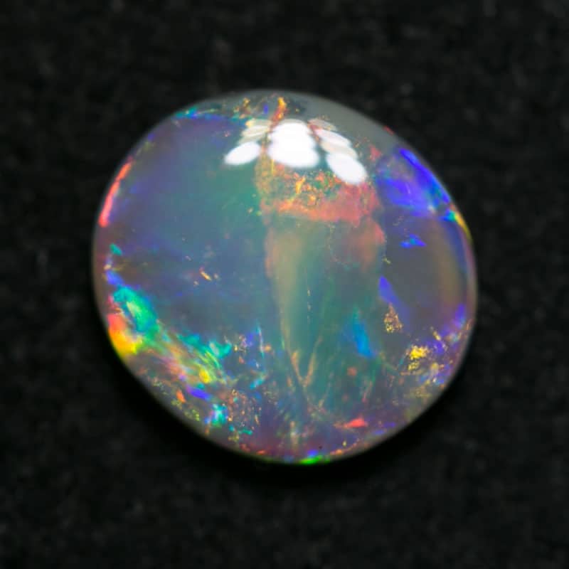 0.97 ct crystal opal 7.5x7x2mm - Image 2
