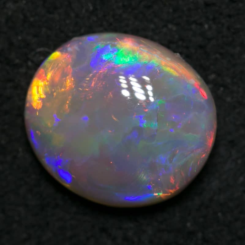 0.97 ct crystal opal 7.8x7x3mm - Image 4