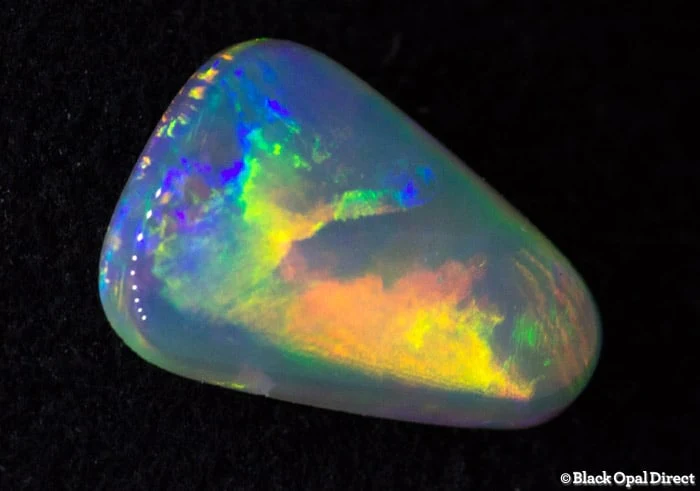 0.97 ct crystal opal in a triangle shape 9x6.5x3mm - Image 2