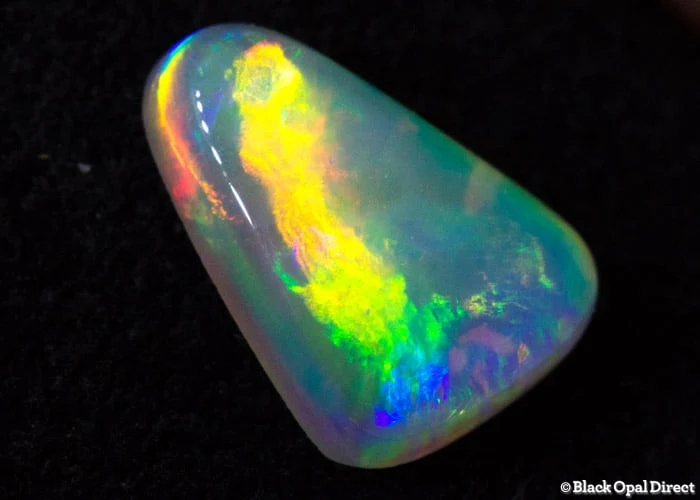 0.97 ct crystal opal in a triangle shape 9x6.5x3mm - Image 3