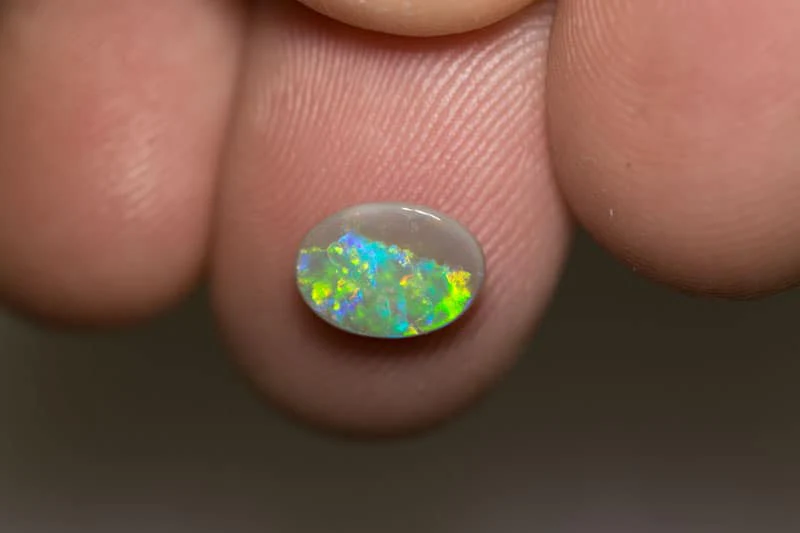 0.97 ct dark opal 9x6x2.5mm - Image 5