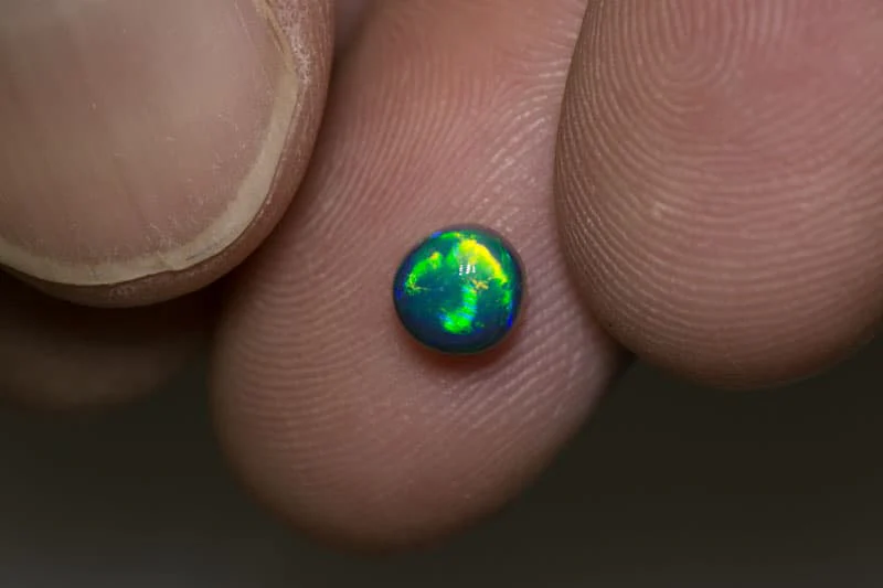 0.97 ct gem black opal 5.5 round x4.5mm thick - Image 2