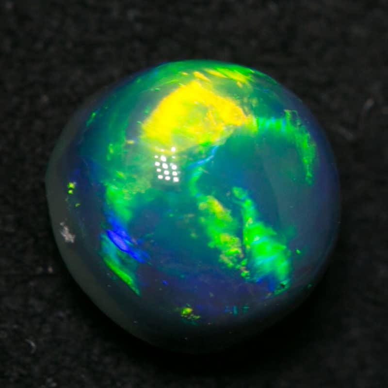 0.97 ct gem black opal 5.5 round x4.5mm thick - Image 3