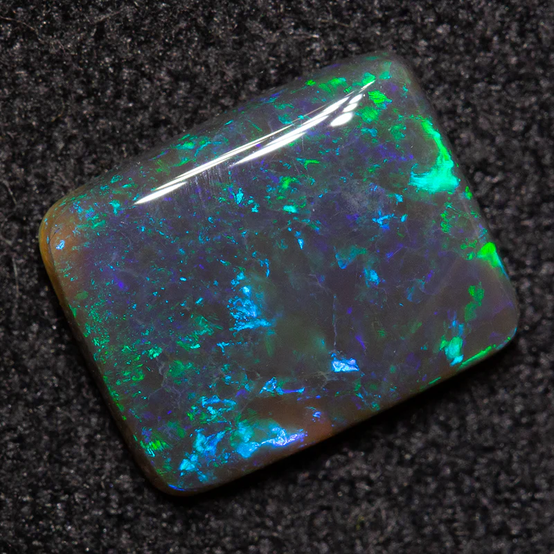 0.98 ct black opal 8.3x6.6x2.1mm - Image 2