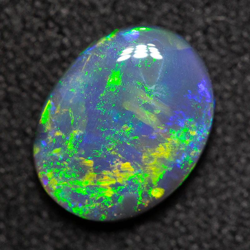 0.98 ct black opal 8.4x6.6x2.6mm - Image 3