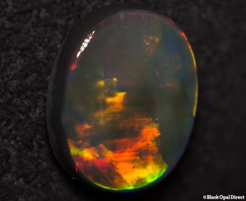 0.98 ct black opal 8x7x2.5mm - Image 2