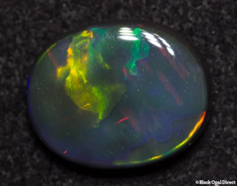 0.98 ct black opal 8x7x2.5mm - Image 3