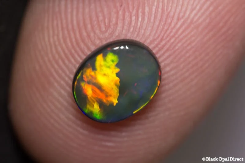 0.98 ct black opal 8x7x2.5mm - Image 4