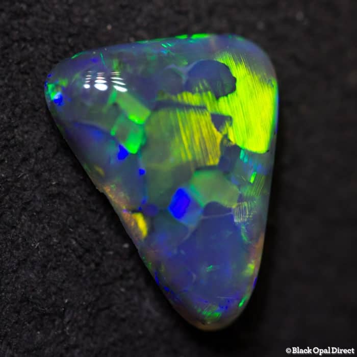 0.98 ct black opal 9x7x2.5mm - Image 4