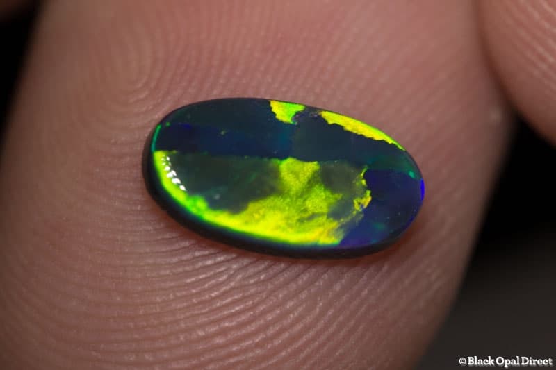 0.98 ct black opal gem 11x6x2mm - Image 2