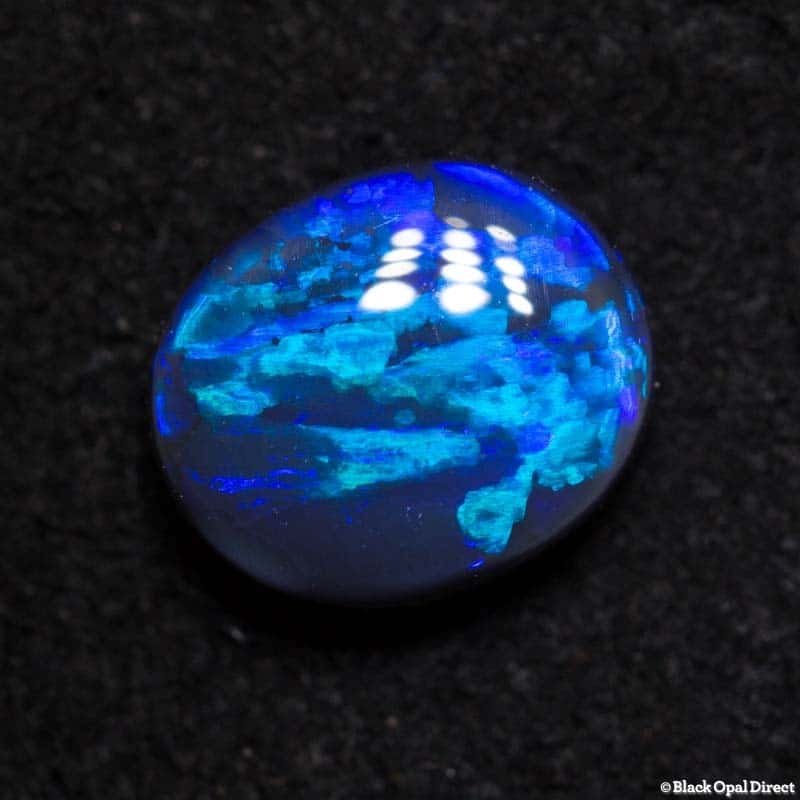 0.98 ct black opal with wedgtail pattern 7.2x6x3mm - Image 2