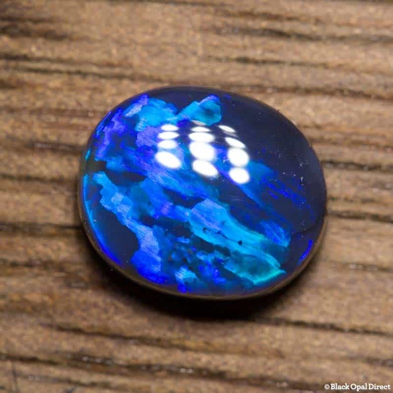 0.98 ct black opal with wedgtail pattern 7.2x6x3mm - Image 3