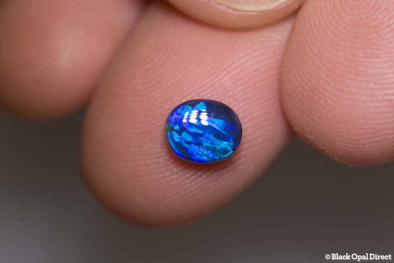 0.98 ct black opal with wedgtail pattern 7.2x6x3mm - Image 4