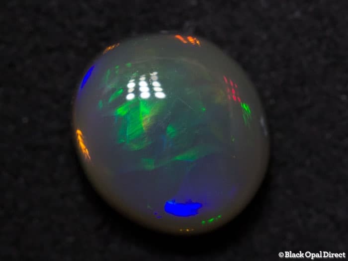 0.98 ct semi black opal 7x6x4mm - Image 2