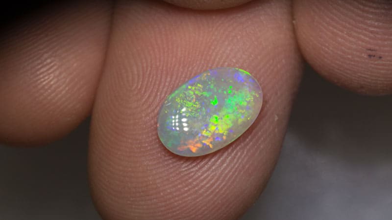 0.98 ct white opal 11x7x4mm - Image 2