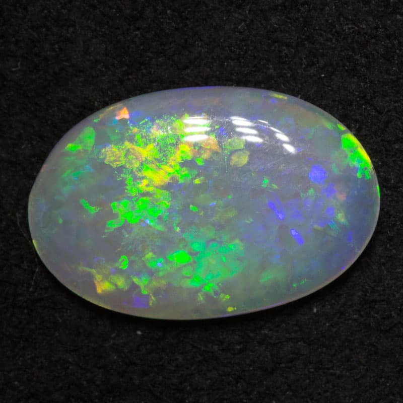 0.98 ct white opal 11x7x4mm - Image 3