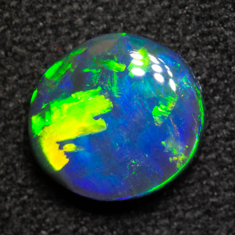 0.99 ct black opal 7.1x6.7x3mm - Image 2