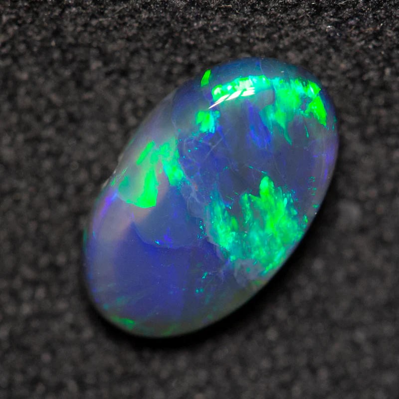 0.99 ct black opal 9x5.5x3mm - Image 2