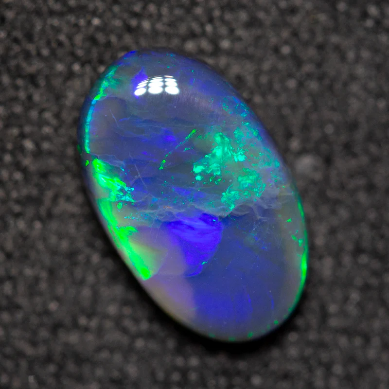 0.99 ct black opal 9x5.5x3mm - Image 3