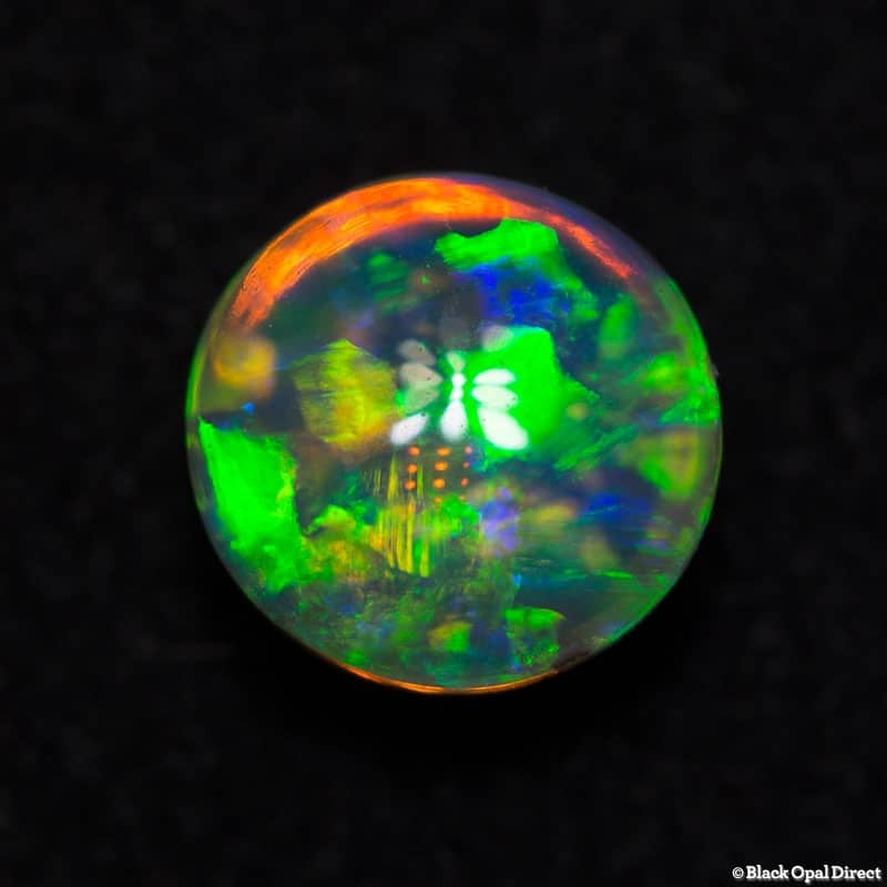 0.99 ct gem double sided crystal opal 6mm round x 4mm - Image 6