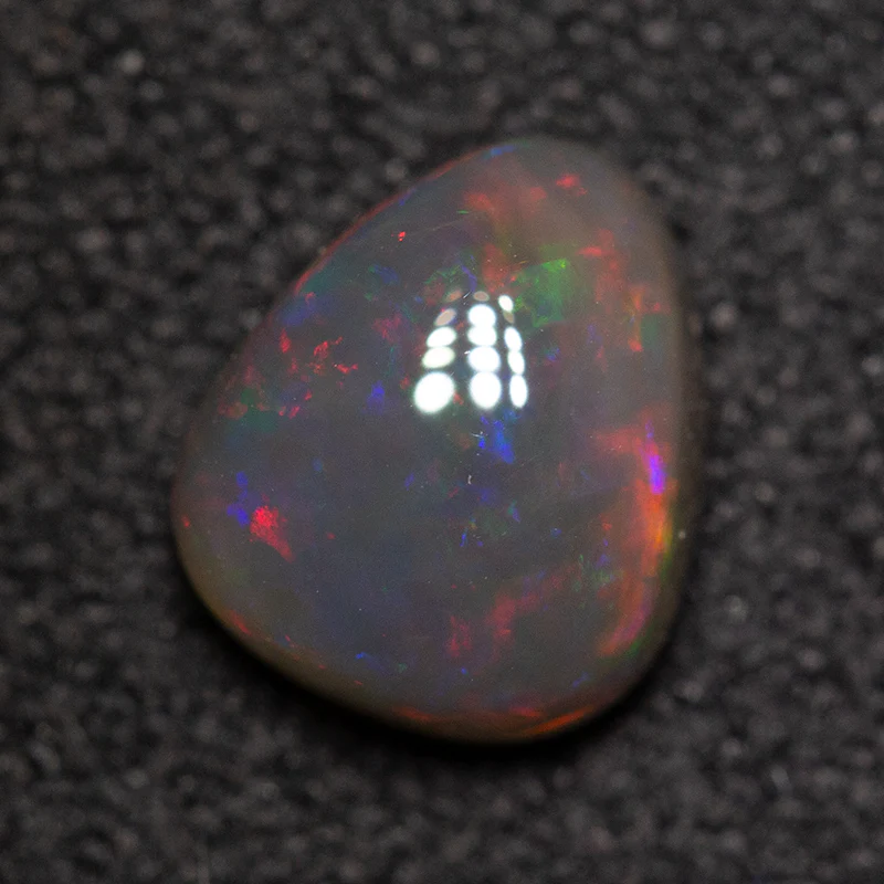 1.00 ct black crystal opal 7.1x6x3.6mm - Image 2