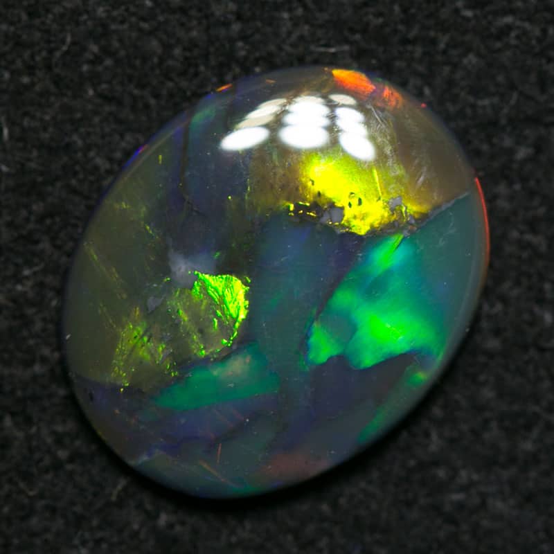 1.00 ct black opal 10x8x2mm - Image 2