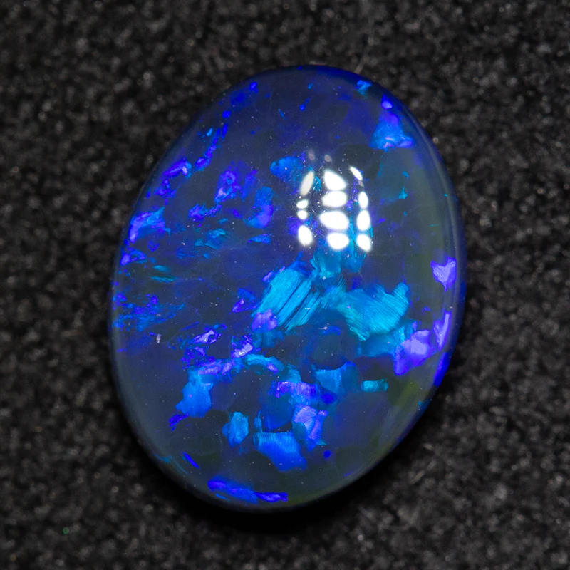 1.00 ct black opal 8.2x6.5x3mm - Image 2