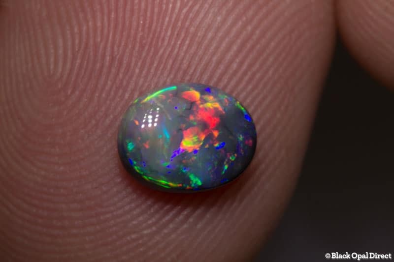 1.00 ct semi black opal 8x6x3mm - Image 2