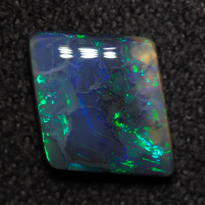 1.02 ct black opal 9.9x8x2.6mm - Image 2