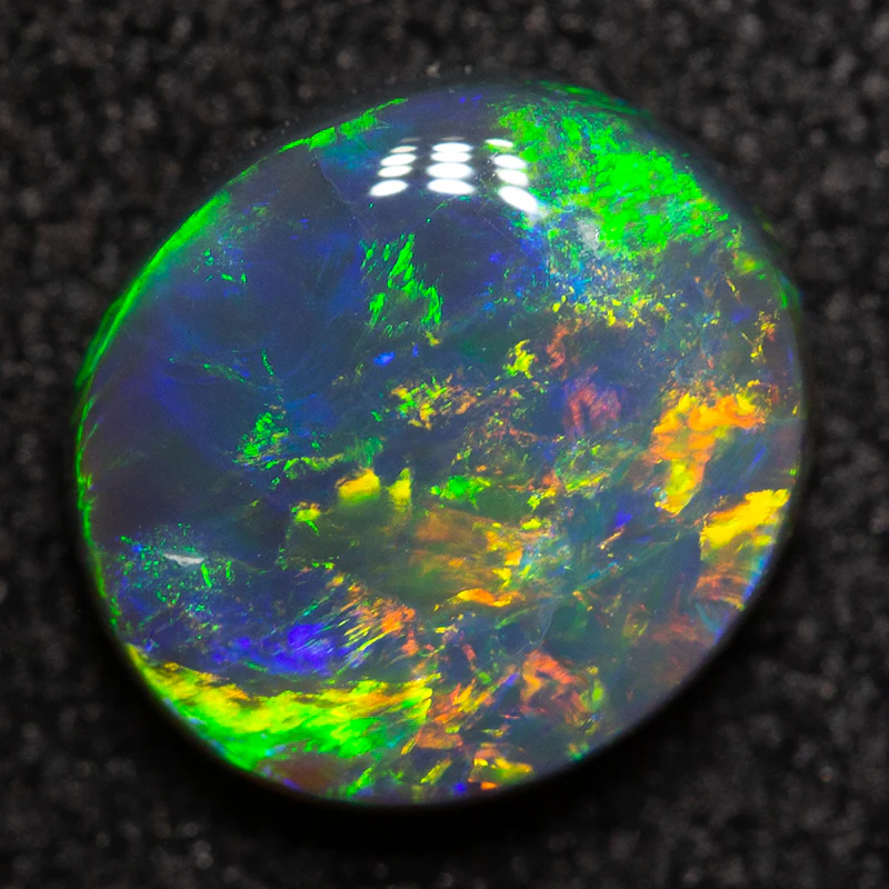 1.03 ct black opal 7.6x6.9x2.9mm - Image 2
