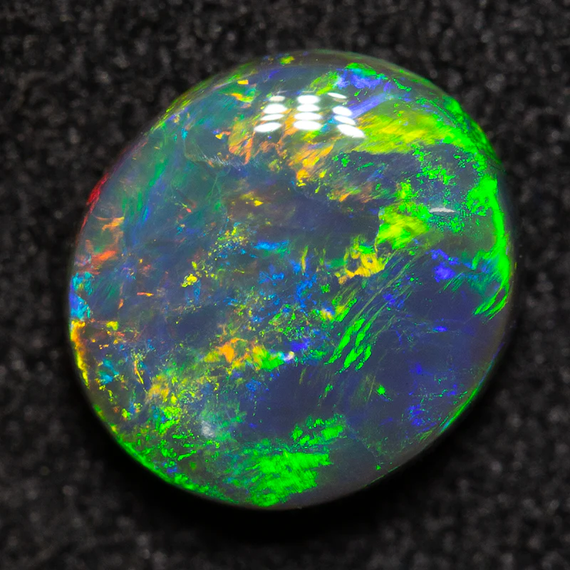 1.03 ct black opal 7.6x6.9x2.9mm - Image 3
