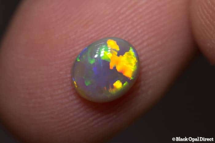 1.03 ct semi black opal 7x6x3mm - Image 2