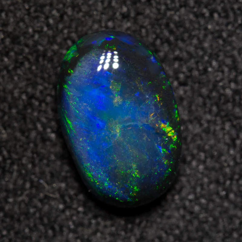 1.04 ct black opal 8.4x5.5x3.4mm - Image 2