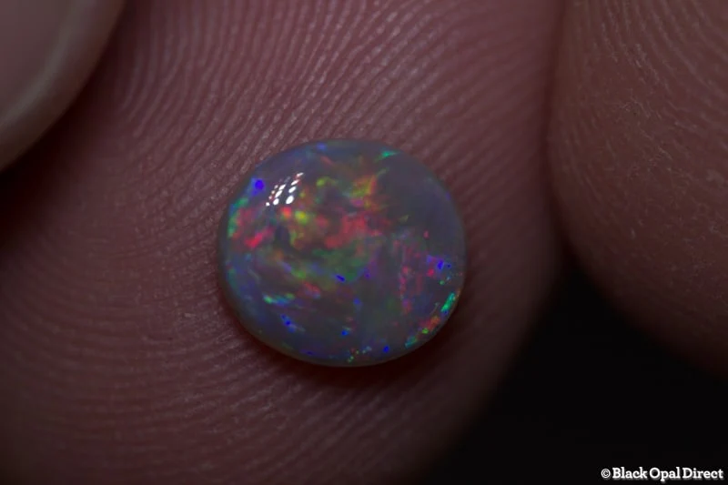 1.04 ct semi black opal 8x7x3mm - Image 2