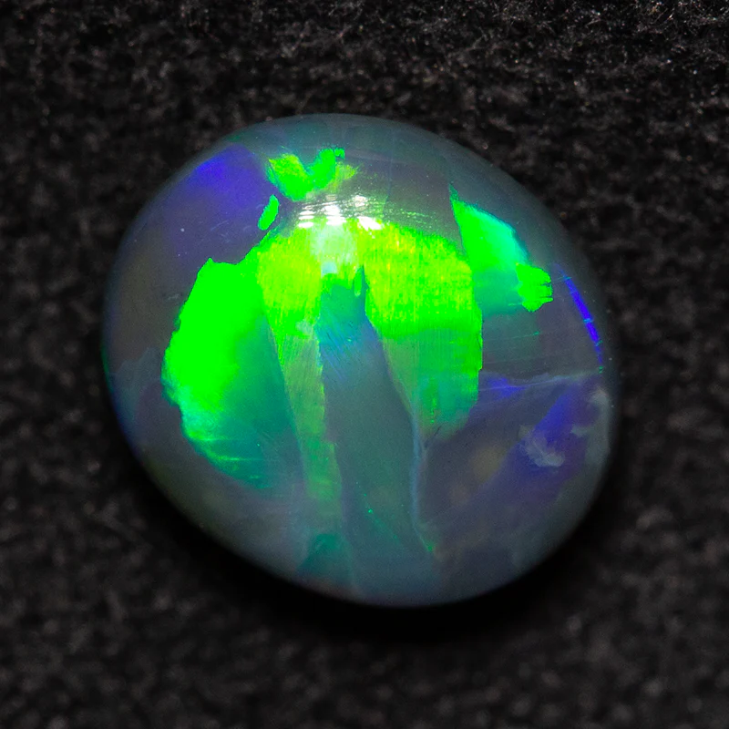 1.05 ct black opal 7.4x6.5x3.6mm - Image 2