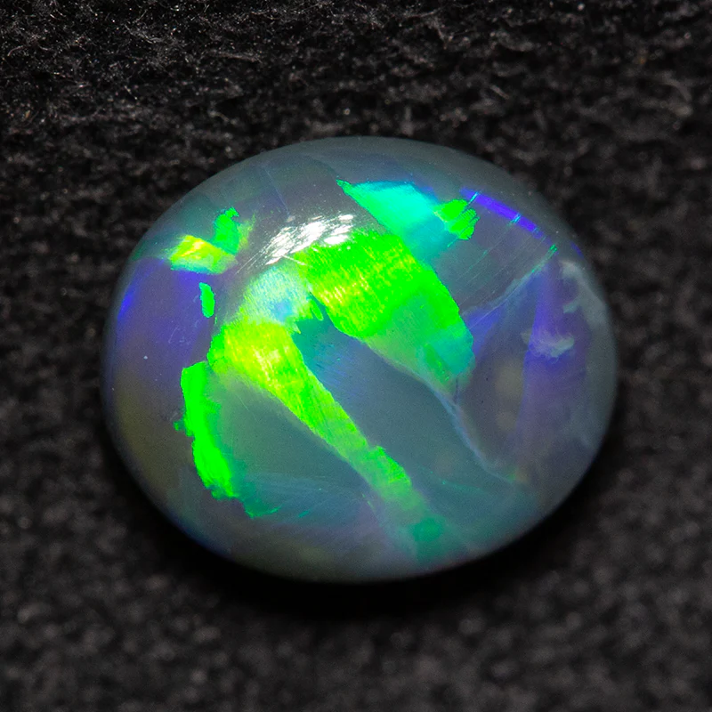 1.05 ct black opal 7.4x6.5x3.6mm - Image 3