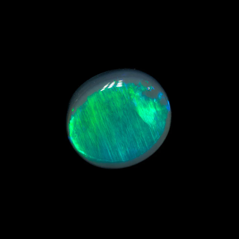 1.05 ct black opal 7.4x6.5x3mm - Image 2