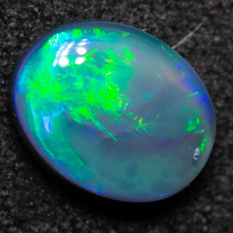 1.05 ct black opal 7.8x6.1x3.4mm - Image 2