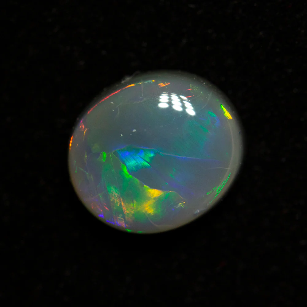 1.05 ct black opal 7.9x6.4x3.1mm - Image 2