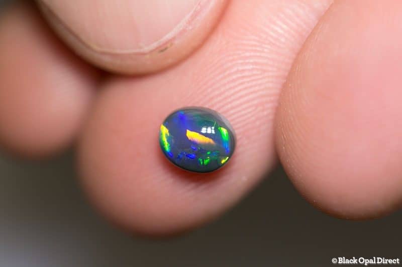 1.05 ct black opal 7x6x3.5mm - Image 2